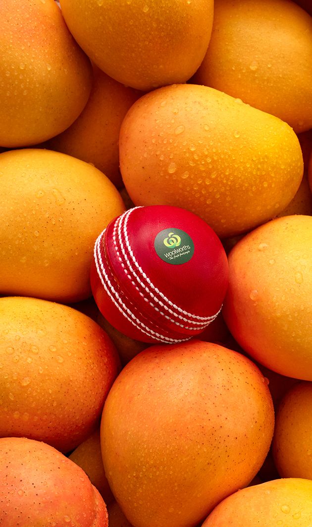 Cricket ball amongst seasonal mangoes